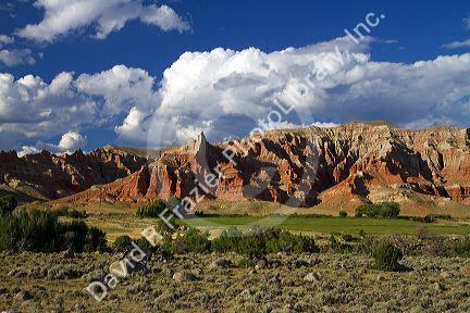 Red rock cliffs and newly harvested alfalfa hay near Dubois, Wyoming, USA.
