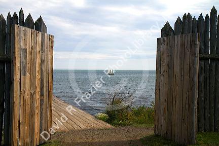 Grand Portage footpath with a replica sailing canoe in the distance at the Grand Portage National Monument on the north shore of Lake Superior in northeastern Minnesota, USA.