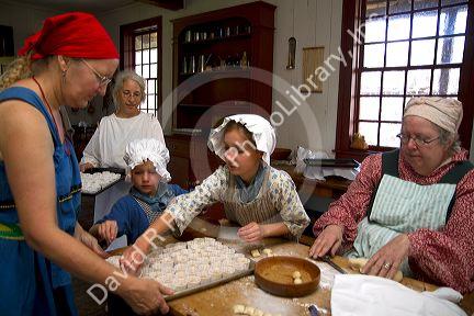 People participate in a rendezvous re-enactment at the Grand Portage National Monument on the north shore of Lake Superior in northeastern Minnesota, USA.