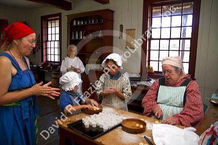 People participate in a rendezvous re-enactment at the Grand Portage National Monument on the north shore of Lake Superior in northeastern Minnesota, USA.