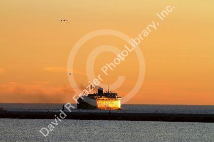 The SS Badger, a coal-fired passenger and vehicle ferry on Lake Michigan leaving Ludington, Michigan, USA.