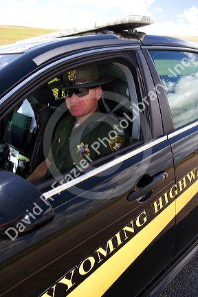 Wyoming Highway Patrol officer on I-90 near the Wyoming, South Dakota border, USA.