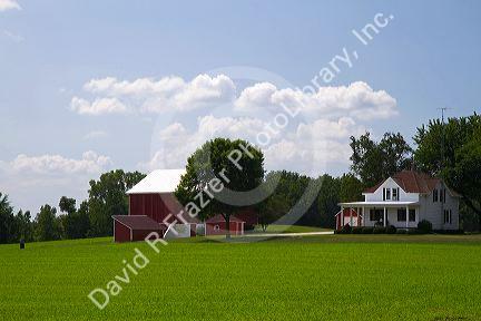 Farmhouse and red barn along U.S. Highway 10 near Brilliion, Wisconsin, USA.