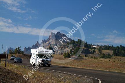 Vehicles travel through Crater Lake National Park located in southern Oregon, USA.