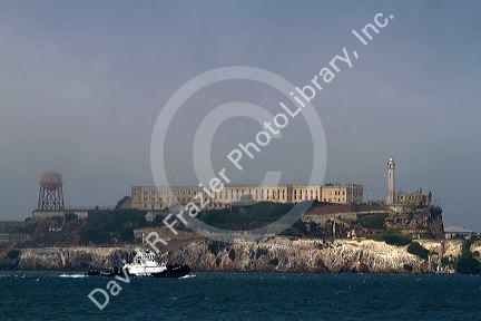 Tugboat Millenium Star near Alcatraz Island in the San Francisco Bay, California, USA.