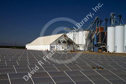 Solar panels create energy used for powering the rice dryer at California Family Foods in Arbuckle, California, USA.