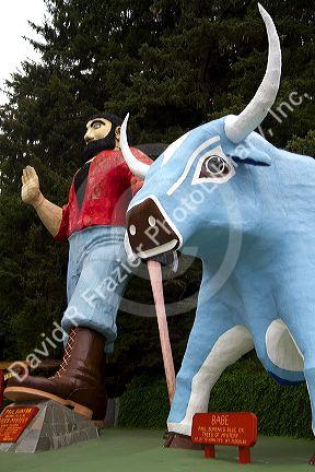 Paul Bunyan and Babe the Blue Ox statues at Trees of Mystery, a roadside attraction located in Klamath, California, USA.