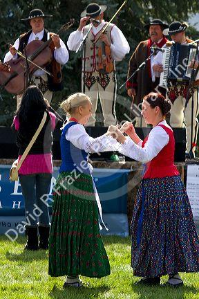 Polish Highlanders folk dancers and musicians perform at the Trailing of the Sheep Festival in Hailey, Idaho, USA.