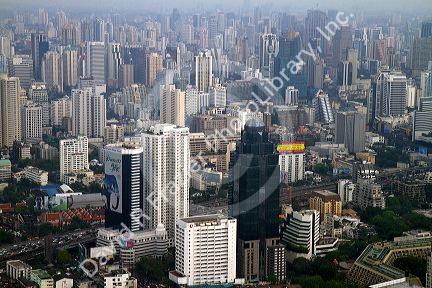 View of the Bangkok cityscape taken from the Baiyoke Tower II showing air pollution and smog, Thailand.