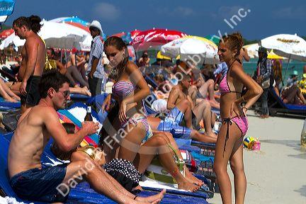 People sun bathing at Chaweng beach on the island of Ko Samui, Thailand.