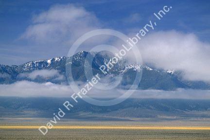 Low clouds and fog hang on moutains 45 miles north of Ely, Nevada.