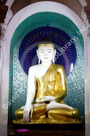 Buddha statue at the Shwedagon Paya located in (Rangoon)Yangon, (Burma) Myanmar.