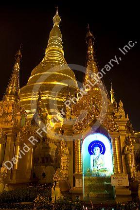 Buddha statue at the Shwedagon Paya located in (Rangoon)Yangon, (Burma) Myanmar.