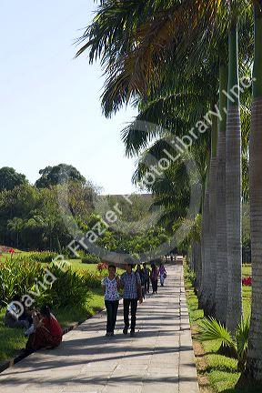 People walk along Inya Lake in (Rangoon) Yangon, (Burma) Myanmar.