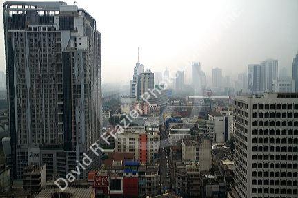 View of the Bangkok cityscape taken from the Baiyoke Tower II showing air pollution and smog, Thailand.