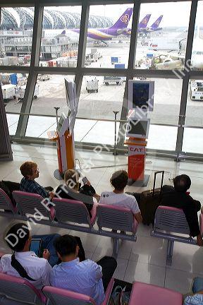 Departure gate and waiting area in the terminal at the Suvarnabhumi Airport also known as the New Bangkok International Airport in Bangkok, Thailand.