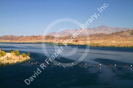 The Colorado River at Parker Dam creates Lake Havasu reservoir in La Paz County, Arizona and San Bernardino County, California, USA.