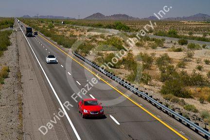 Vehicles travel on Interstate 10 west of Phoenix, Arizona, USA.