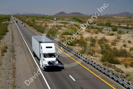 Freight transport truck traveling on Interstate 10 near Tucson, Arizona, USA.