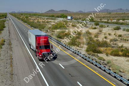 Freight transport truck traveling on Interstate 10 near Tucson, Arizona, USA.