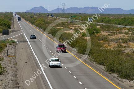 Vehicles travel on Interstate 10 west of Phoenix, Arizona, USA.