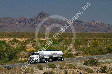Oil transport truck traveling on Interstate 10 west of Phoenix, Arizona, USA.