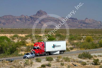 Freight transport truck traveling on Interstate 10 near Tucson, Arizona, USA.