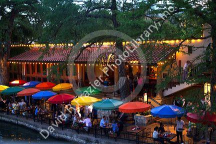 Colorful umbrellas at the Casa Rio restaurant along the River Walk in San Antonio, Texas, USA.