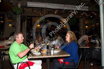 Outdoor dining along the River Walk in San Antonio, Texas, USA.