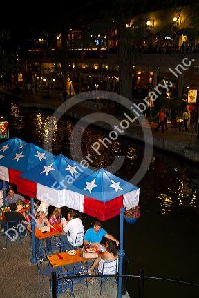 Outdoor dining along the River Walk in San Antonio, Texas, USA.