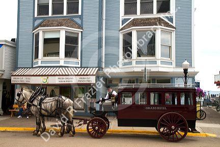 The Grand Hotel horse drawn carriage on Mackinac Island located in Lake Huron, Michigan, USA.