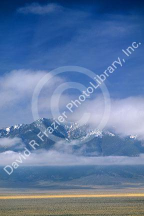 Low clouds and fog hang on moutains 45 miles north of Ely, Nevada.