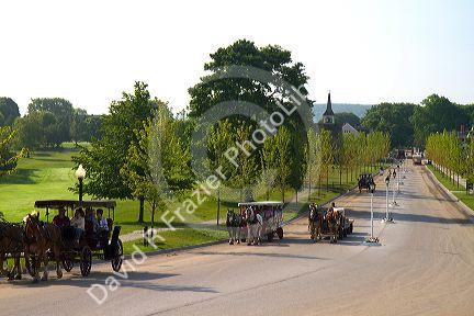 Horse drawn carriages on Mackinac Island located in Lake Huron, Michigan, USA.