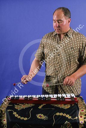 A man playing a glockenspiel.