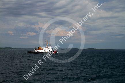 United States Coast Guard Cutter, Biscayne Bay icebreaking tug on Lake Huron, Michigan, USA.