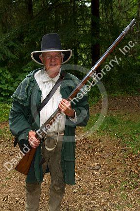 Musket demonstration at Fort Clatsop in the Lewis and Clark National Historical Park located near the mouth of the Columbia River, Oregon, USA.