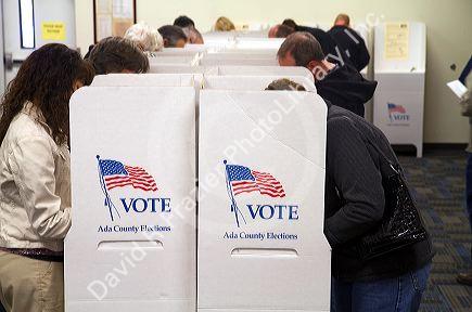 People vote in cardboard voting booths at a polling station in Boise, Idaho, USA.