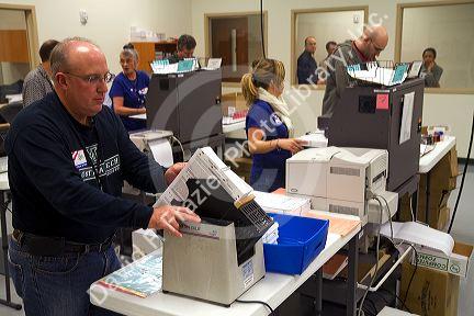 Ballot scanners tabulating voting results on election day in Boise, Idaho, USA.