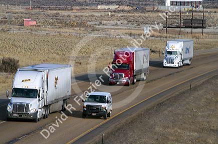 Semi trucks on Interstate 84 near Boise, Idaho, USA.