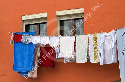 Clothes line hanging from a residence in San Vicente de al Barquera, Cantabria, Spain.