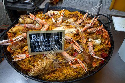 A large pan of paella for sale in a Basque market at Saint-Jean-de-Luz in the Basque province of Labourd, southwestern France.