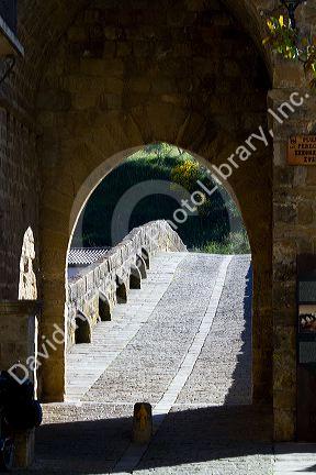 Six-arched Roman bridge spanning the Arga River on the Way of St. James pilgrimage route in Puente La Reina, Navarra, Spain.