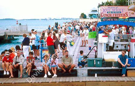 Crowds gathers  at Mallory Square water front in Key West Florida for sunset.