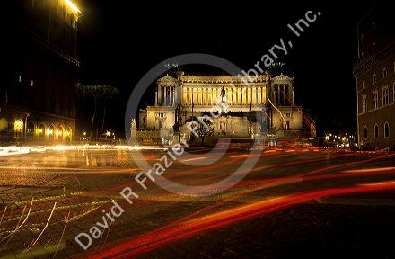 Piazza Venezia at night in Rome, Italy.