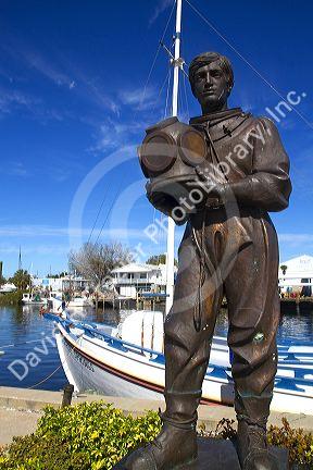 Statue of a sponge diver on the waterfront at Tarpon Springs, Florida, USA.