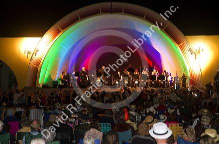 People attend a concert in a shell theater during the Tremains Art Deco Weekend  at Napier in the Hawke's Bay Region, North Island, New Zealand.