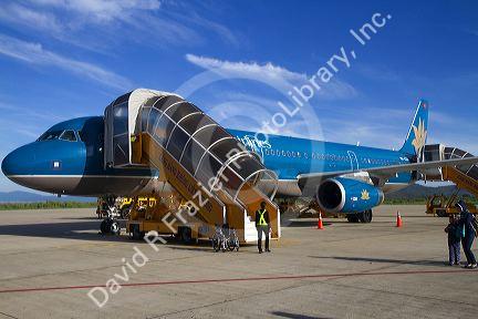 Vietnam Airlines airbus at the Lien Khuong Airport in Central Highlands region of Vietnam.
