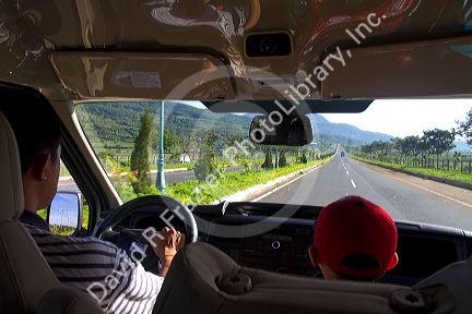 View of the road from a taxi near Da Lat, Vietnam.