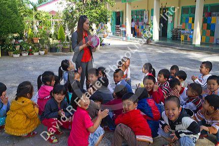 Young students outdoors at an elementary school in Da Lat, Vietnam.