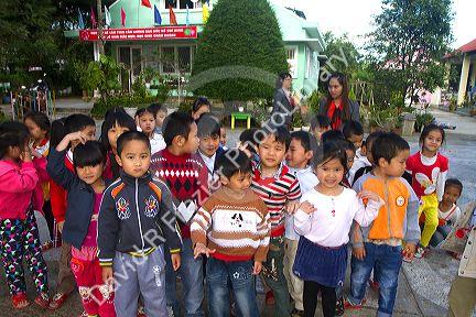 Young students outdoors at an elementary school in Da Lat, Vietnam.